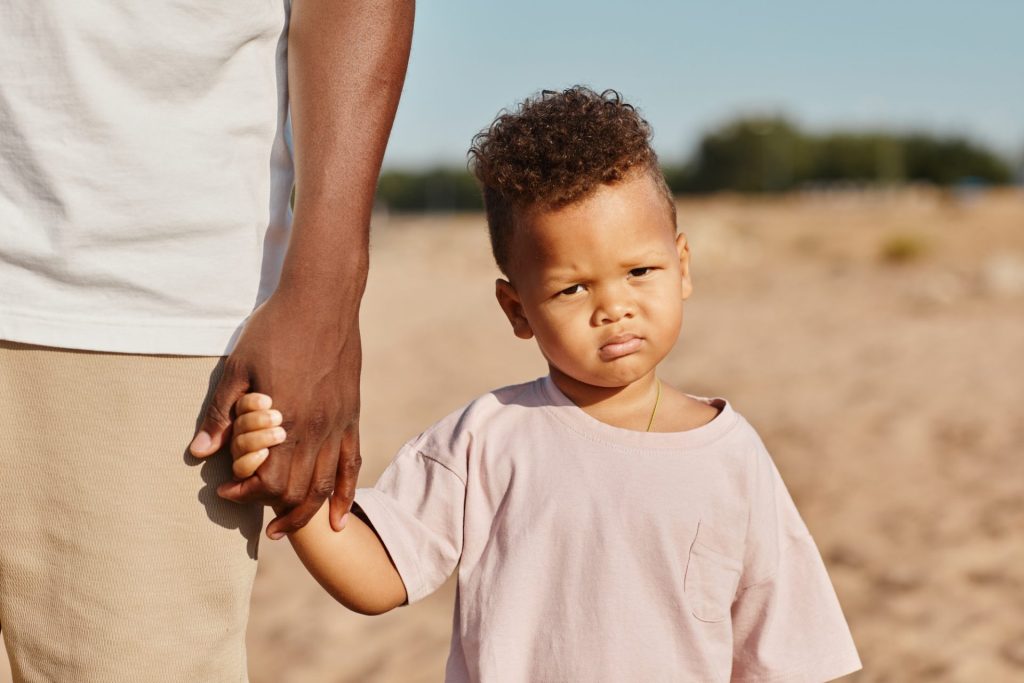 Cute Boy with Dad at Beach